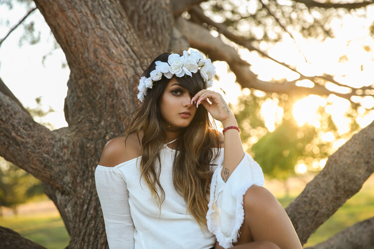 24-70mm lens woman in a tree