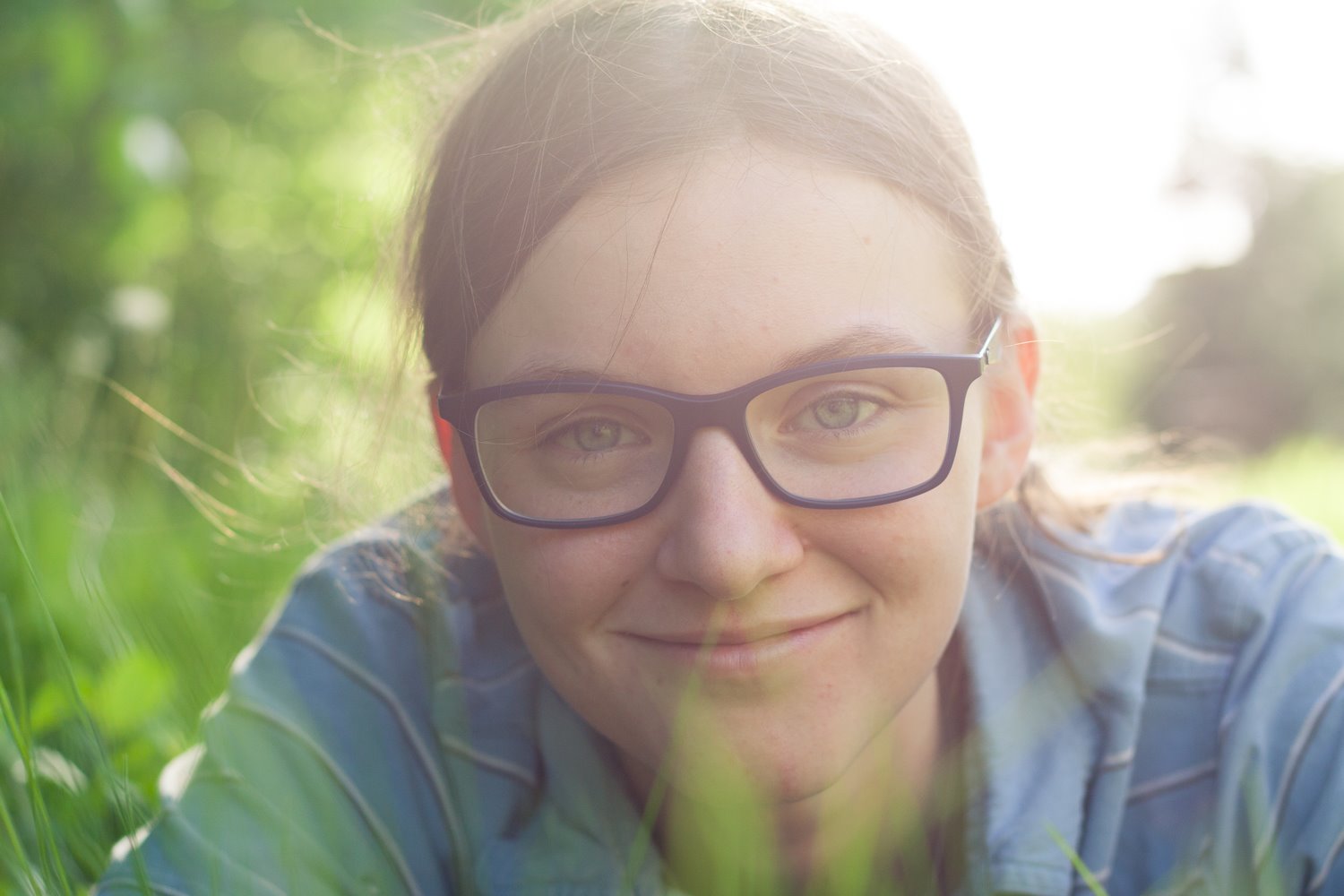 portrait subject in the grass